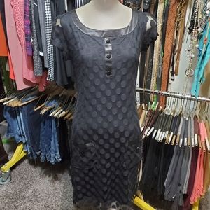 Black polka-dot dress with satin trim